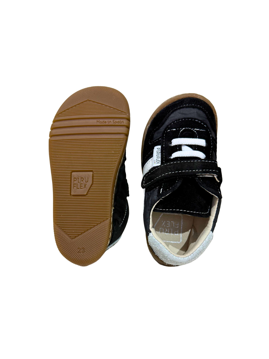 Piel, ante y derrame negro y blanco.
